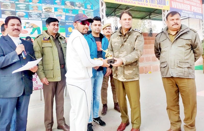 SSP RC Kotwal presenting man of the match trophy to a player at Sports Stadium Kathua on Monday. SSP RC Kotwal presenting man of the match trophy to a player at Sports Stadium Kathua on Monday.