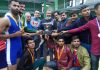 Director Dr Daud Iqbal Baba presenting the trophy to the winning team at University of Jammu.