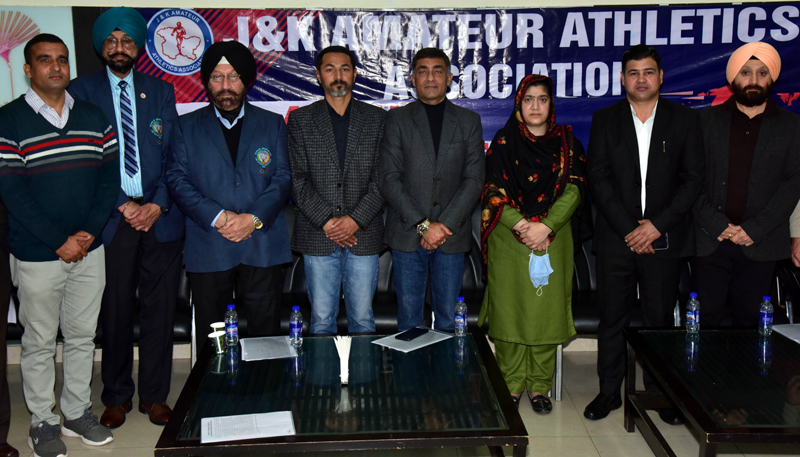 Newly elected office bearers of J&K Amateur Athletics Association posing for group photograph.