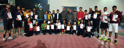 Winners displaying certificates while posing with dignitaries at MA Stadium Jammu. Winners displaying certificates while posing with dignitaries at MA Stadium Jammu.