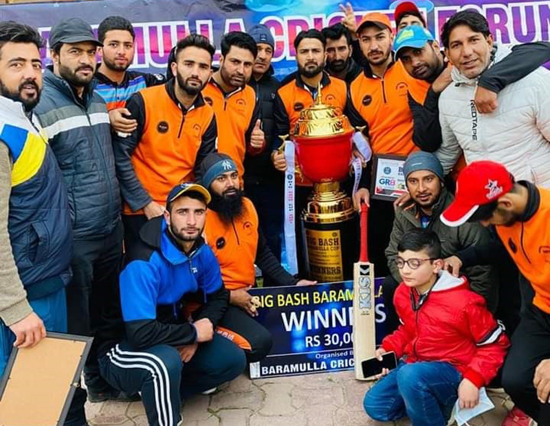 Winning team posing for photograph with title trophy. -Excelsior/Abid Nabi Winning team posing for photograph with title trophy. -Excelsior/Abid Nabi