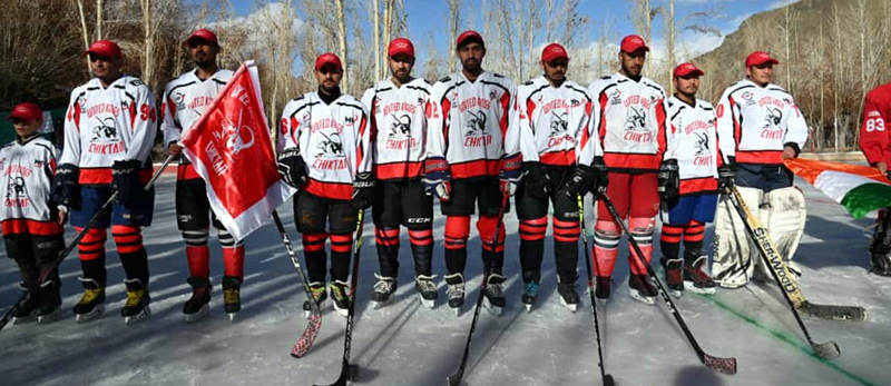 Players posing for a group photograph during the inaugural ceremony of Ice Hockey at Chiktan in Kargil.
