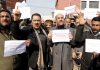 EJAC members staging protest in Srinagar on Thursday. -Excelsior/Shakeel