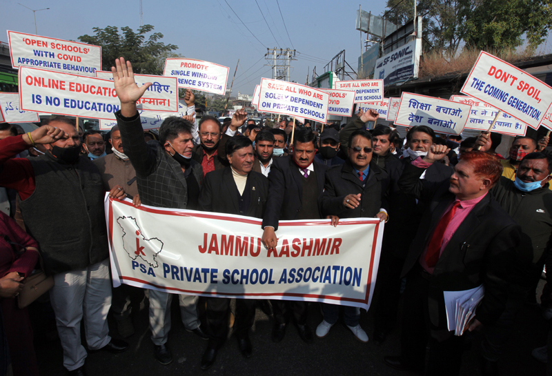 Owners of private schools during a protest in Jammu on Friday. -Excelsior/Rakesh