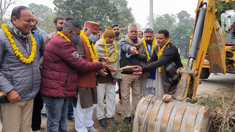 Bharat Bhushan Bodhi and others formally launching road upgradation work in Marh on Sunday. Bharat Bhushan Bodhi and others formally launching road upgradation work in Marh on Sunday.