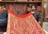 Angad Creations founder Jaspreet Singh Bahri displaying new range of 'Janavar' shawls in Jammu.
