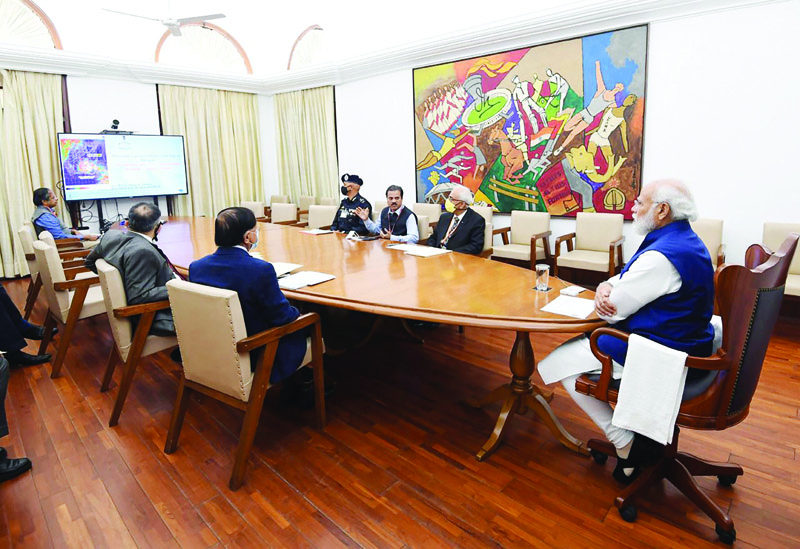 Prime Minister Narendra Modi chairing a meeting over cyclonic conditions in the Arabian Sea, in New Delhi on Thursday. (UNI)