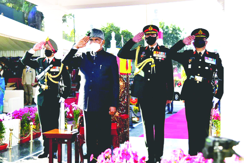 Presiden Ram Nath Kovind reciving salute during pssing out parade at Indian Military Academy in Dehradun on Saturday. (UNI)