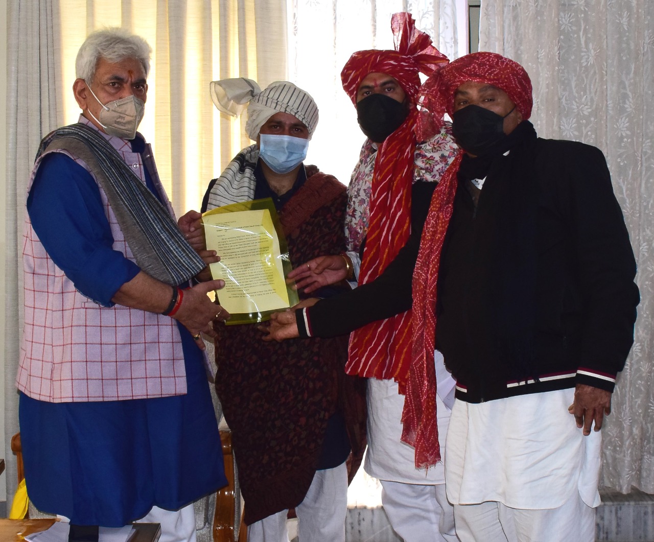 Lt Governor Manoj Sinha with delegation of Pahari Tribe ST Forum in Jammu on Friday. Lt Governor Manoj Sinha with delegation of Pahari Tribe ST Forum in Jammu on Friday.