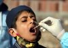 A boy being subjected to COVID test in Mendhar in Poonch district on Tuesday. — Excelsior/Rahi Kapoor
