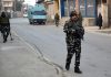 Security personnel at the site of encounter in Srinagar. —Excelsior/Shakeel