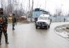 Security forces stand guard near encounter site at Chadoora in Budgam. —Excelsior/Shakeel