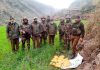 Army recovers a huge consignment of narcotics near LoC in Poonch on Friday. (UNI)