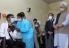 A teenager receiving 1st jab of COVID-19 vaccine at a school in Jammu in presence of LG Manoj Sinha on Monday. -Excelsior/Rakesh