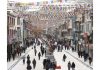 People walking on a street amid snowfall in Leh. (UNI)