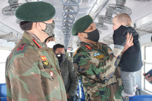 The Army Commanders during journey in train in Anantnag on Wednesday. The Army Commanders during journey in train in Anantnag on Wednesday.