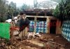 An elderly man standing on the wreckage after his house collapsed due to landslide in Mahore area of Reasi on Monday. — Excelsior/Romesh Mengi
