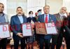 Union Minister Dr Jitendra Singh flanked by Director AIIMS Dr Shakti Gupta and Director IIIM Dr S Reddy during the signing of MoU between the two institutions at Vijaypur on Saturday. —Excelsior/Nischant