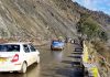 Stranded vehicles moving towards Jammu on the National Highway on Thursday. -Excelsior/Parvaiz Mir