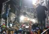 Pilgrims cling on poles to save their lives during stampede at Mata Vaishno Devi Bhawan on Saturday. — Excelsior/Romesh Mengi