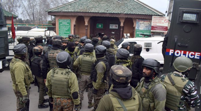 Security forces outside Shalimar Garden after brief shootout in Srinagar. -Excelsior/Shakeel