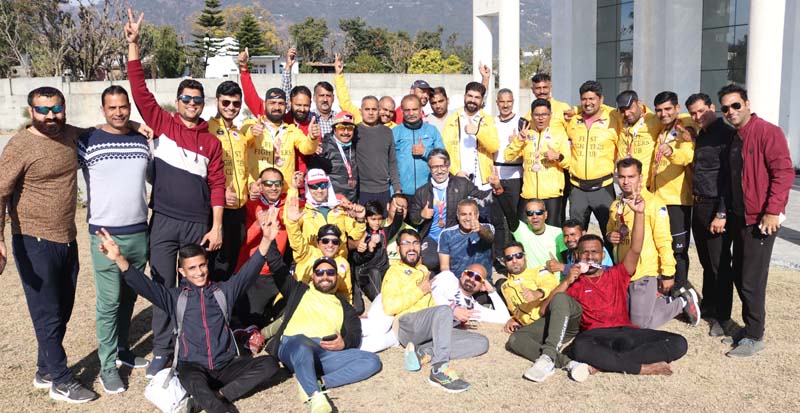 Runners displaying victory signs after completing 50 km Jammu-Katra run at Katra. Runners displaying victory signs after completing 50 km Jammu-Katra run at Katra.