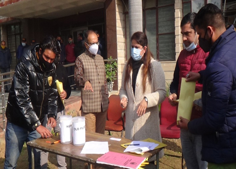 JDA officers during a draw of lots being held at Vikas Bhawan, Jammu on Friday. JDA officers during a draw of lots being held at Vikas Bhawan, Jammu on Friday.