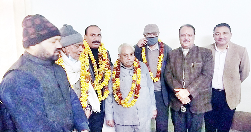 Newly elected President and Vice President of MC Akhnoor and others posing for photograph after oath taking ceremony. Newly elected President and Vice President of MC Akhnoor and others posing for photograph after oath taking ceremony.