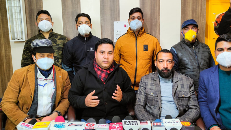 NHM employees addressing press conference in Doda on Sunday. NHM employees addressing press conference in Doda on Sunday.