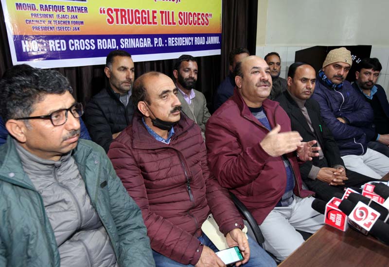 EJAC president, Mohd Rafique Rather, flanked by others addressing press conference in Jammu on Thursday. -Excelsior/Rakesh EJAC president, Mohd Rafique Rather, flanked by others addressing press conference in Jammu on Thursday. -Excelsior/Rakesh