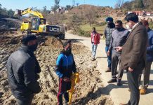 Dy Commissioner Rajouri, Vikas Kundal inspecting progress of work on Jammu-Poonch highway near Sunderbani on Friday.