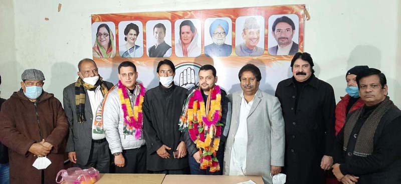 Two Apni Party leaders being welcomed in Cong fold by JKPCC chief G A Mir and others in Jammu.