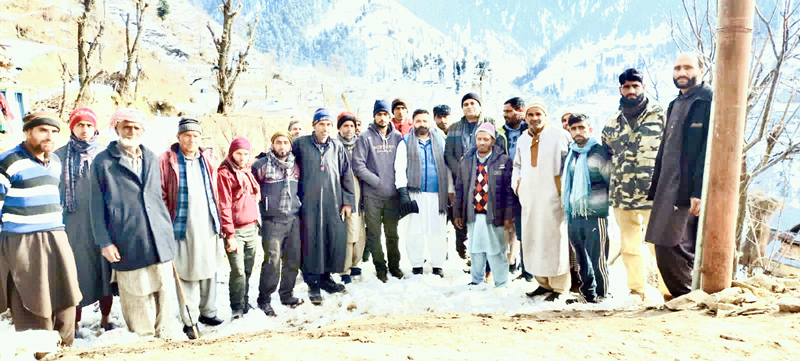 Ex-MLA Aijaz Jan during visit to snow-hit area of Mandi in Poonch on Sunday.