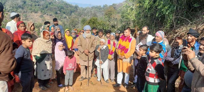 DDC Chairman, Col Mahan Singh during inauguration of road in Basohli on Sunday. DDC Chairman, Col Mahan Singh during inauguration of road in Basohli on Sunday.