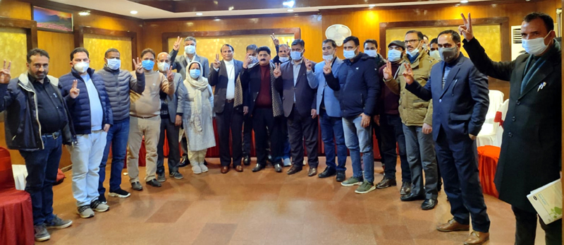 Members of All J&K Revenue Coordination Committee pose for a group photograph.