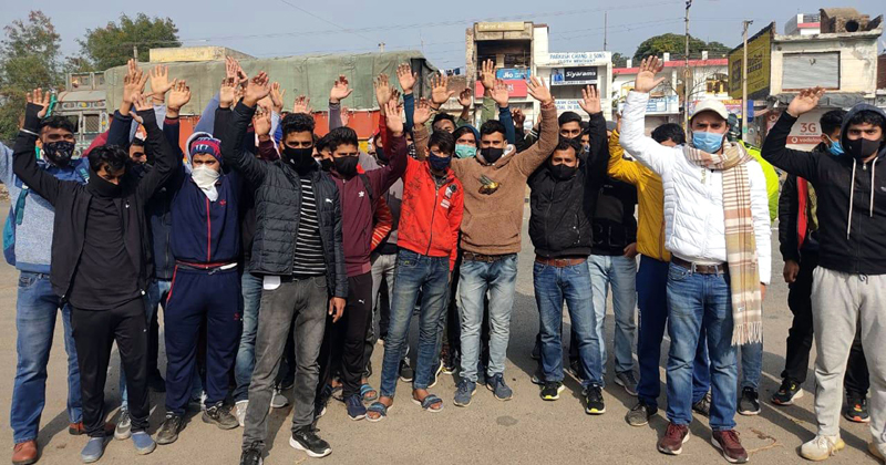 Youth protesting at Jatwal in Samba district on Saturday. -Excelsior/Nischant Youth protesting at Jatwal in Samba district on Saturday. -Excelsior/Nischant