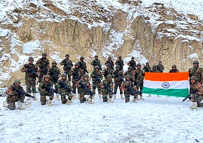 Indian Army personnel holding the national flag Tricolour on the occasion of new year 2022 somewhere in Galwan Valley. (UNI) Indian Army personnel holding the national flag Tricolour on the occasion of new year 2022 somewhere in Galwan Valley. (UNI)