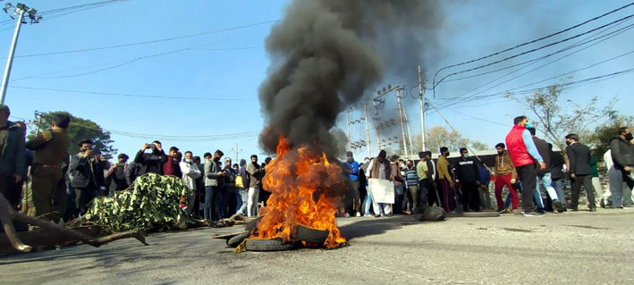 Roop Nagar residents staging protest against JDA in Jammu North on Wednesday. (UNI) Roop Nagar residents staging protest against JDA in Jammu North on Wednesday. (UNI)