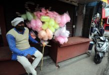 A man waits for customers as he sells cotton candies at Old City in Jammu. — Excelsior/Rakesh