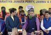 BJP leaders posing for a photograph with new entrants in the party at Jammu on Thursday.