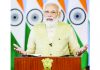 Prime Minister Narendra Modi addressing the 14th Foundation Day celebration at Umiya Mata Temple at Gathila, Junagadh, Gujarat, through video conferencing, in New Delhi on Sunday. (UNI)