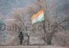 An Army soldier guards LoC in Mendhar with tricolor hoisted on a tree. —Excelsior/Rahi Kapoor