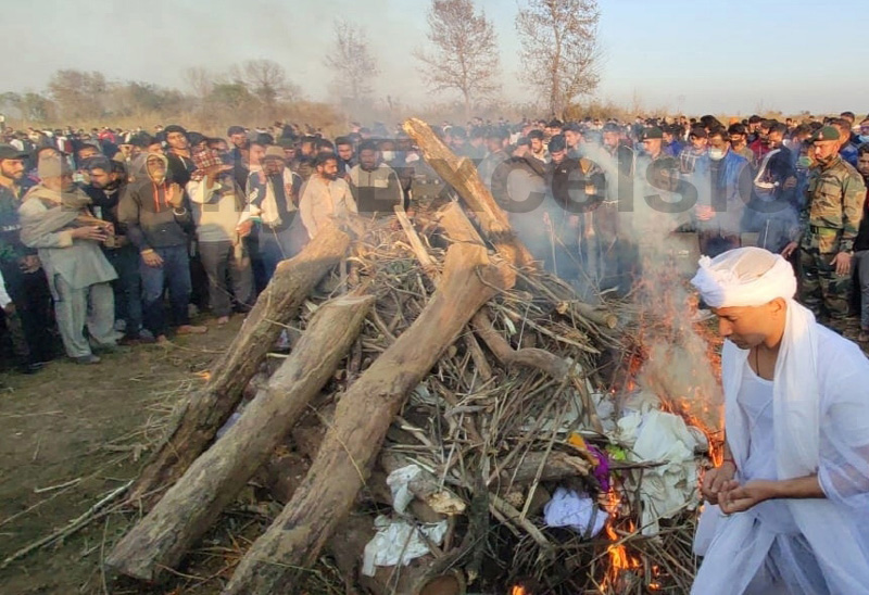 Mortal remains of martyr Vishal Sharma being consigned to flames in Khour area on Saturday.