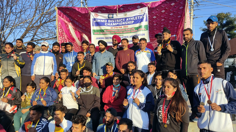 Winners displaying medals while posing with dignitaries at Jammu on Sunday. Winners displaying medals while posing with dignitaries at Jammu on Sunday.