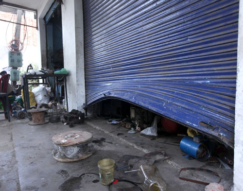 Shutter of a shop damaged by thieves. -Excelsior/Rakesh Shutter of a shop damaged by thieves. -Excelsior/Rakesh