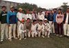 Winners posing for a group photograph at Country Cricket Stadium Gharota on Monday.
