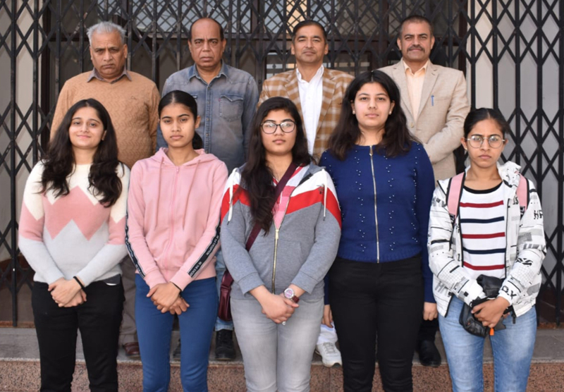 Team players posing for a group photograph with Divisional Sports Officer Jammu, Ashok Singh on Monday.