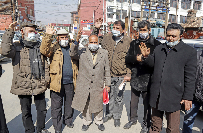 Retired ZEOs staging protest in Srinagar on Saturday. -Excelsior/Shakeel