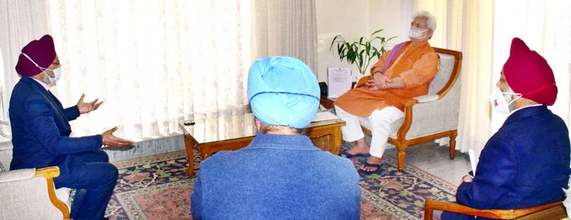 Lt Governor meeting delegation of Sikh Community.