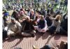 People staging sit-in protest at Gandhi Park in RS Pura area of Jammu.